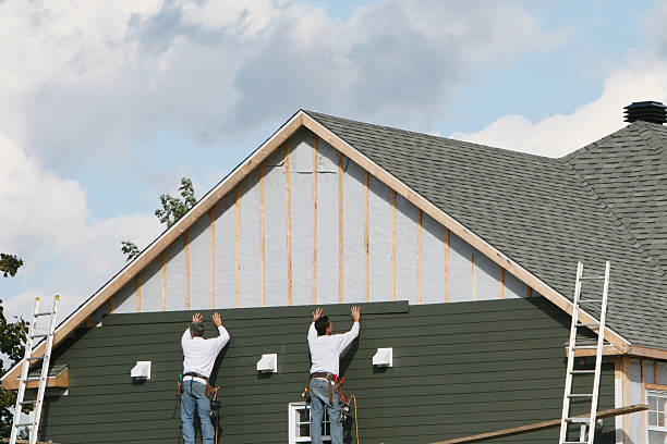 Professional Siding technician working in Dade City, FL
